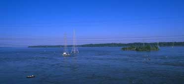 Photo of wheeler reservoir with power lines running  across it